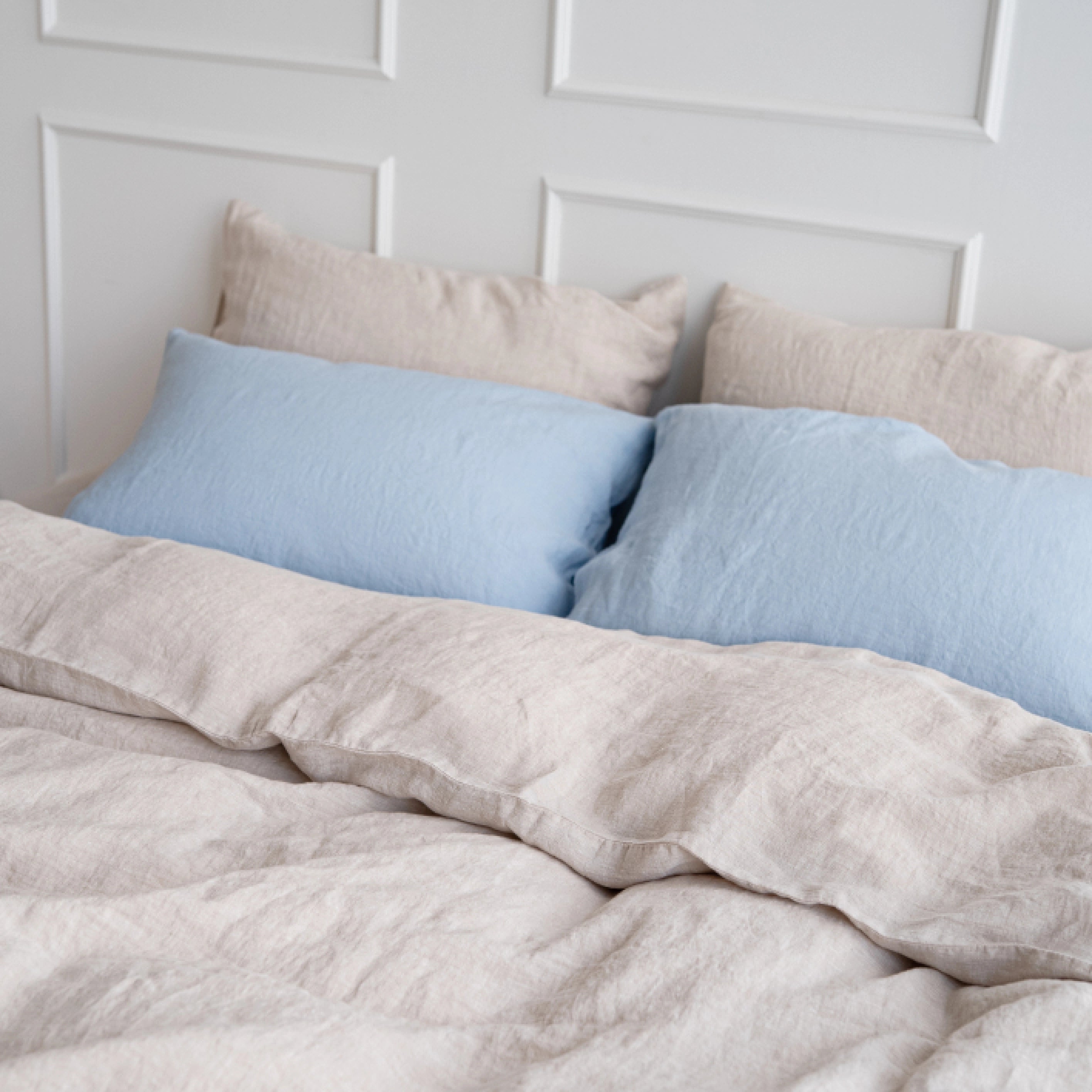 Close-up texture of beige stonewashed European flax linen fabric.
