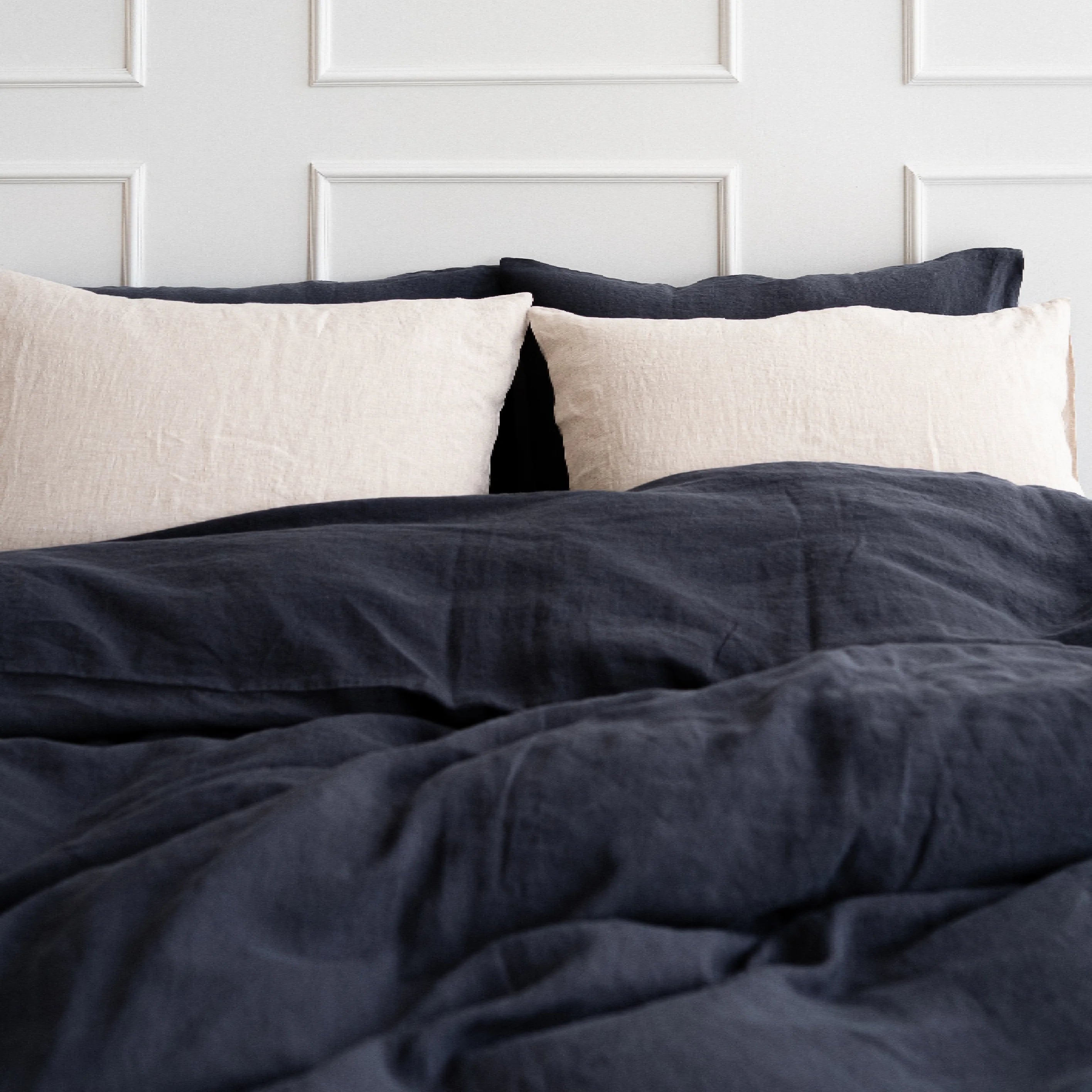 Handmade linen duvet cover with hidden zipper closure in dark grey.