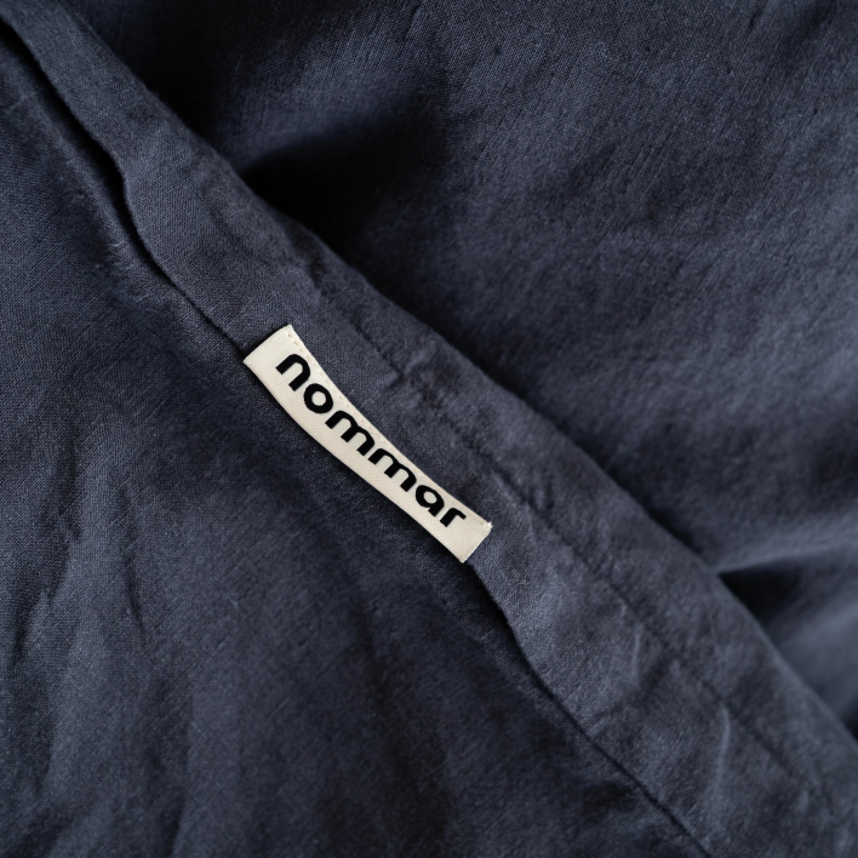 Minimalist handmade dark grey linen duvet cover made from sustainable European flax. nommar