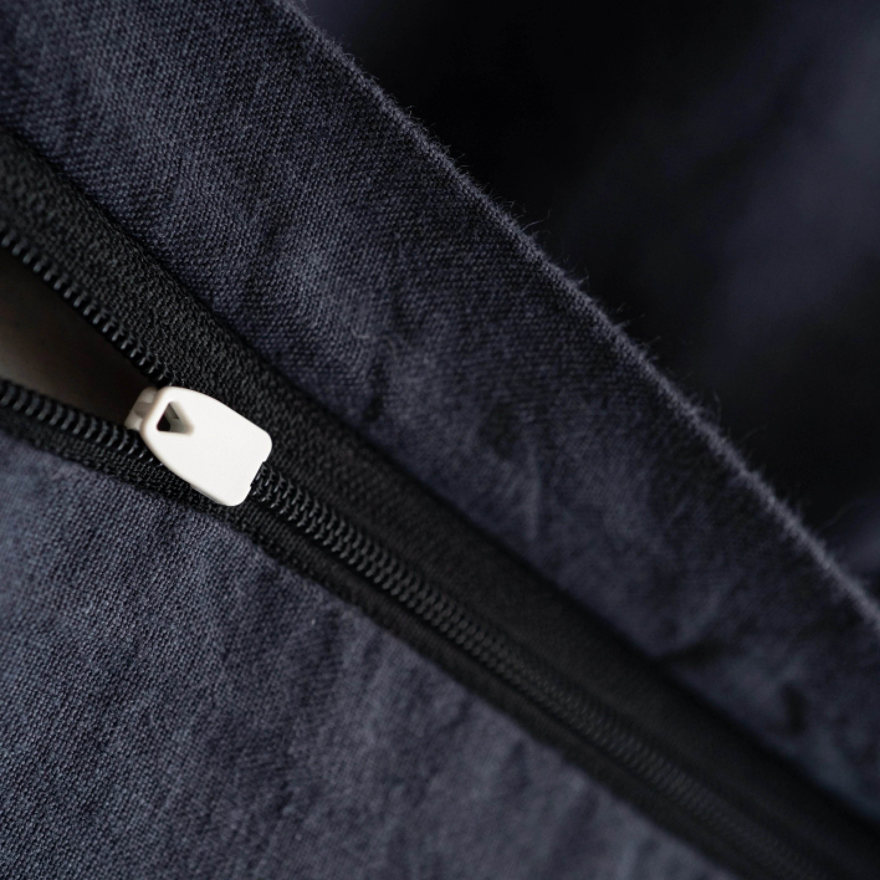Handmade dark grey linen duvet cover showcasing hidden zip detail.