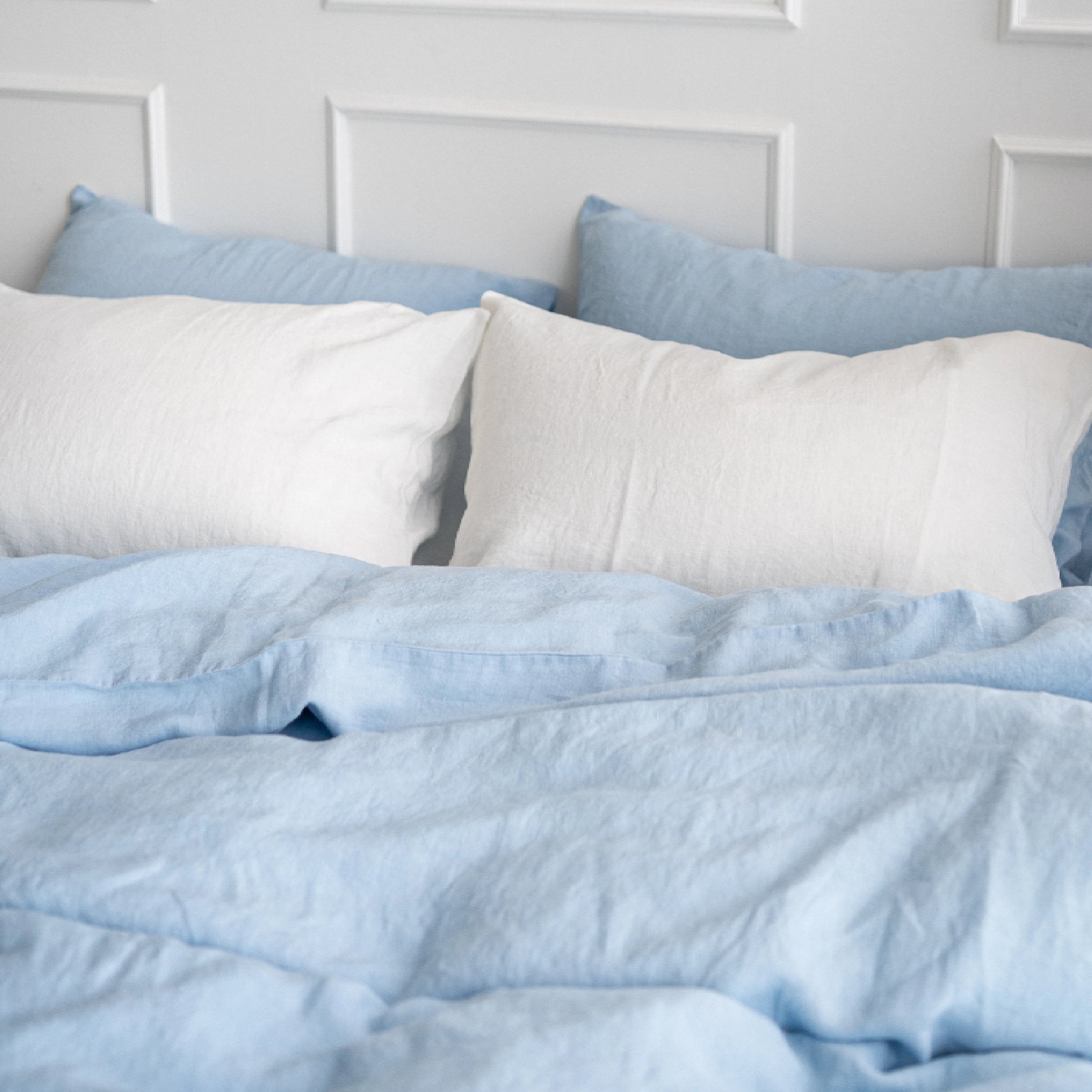 Breathable hypoallergenic powder blue linen duvet cover for all-season comfort.