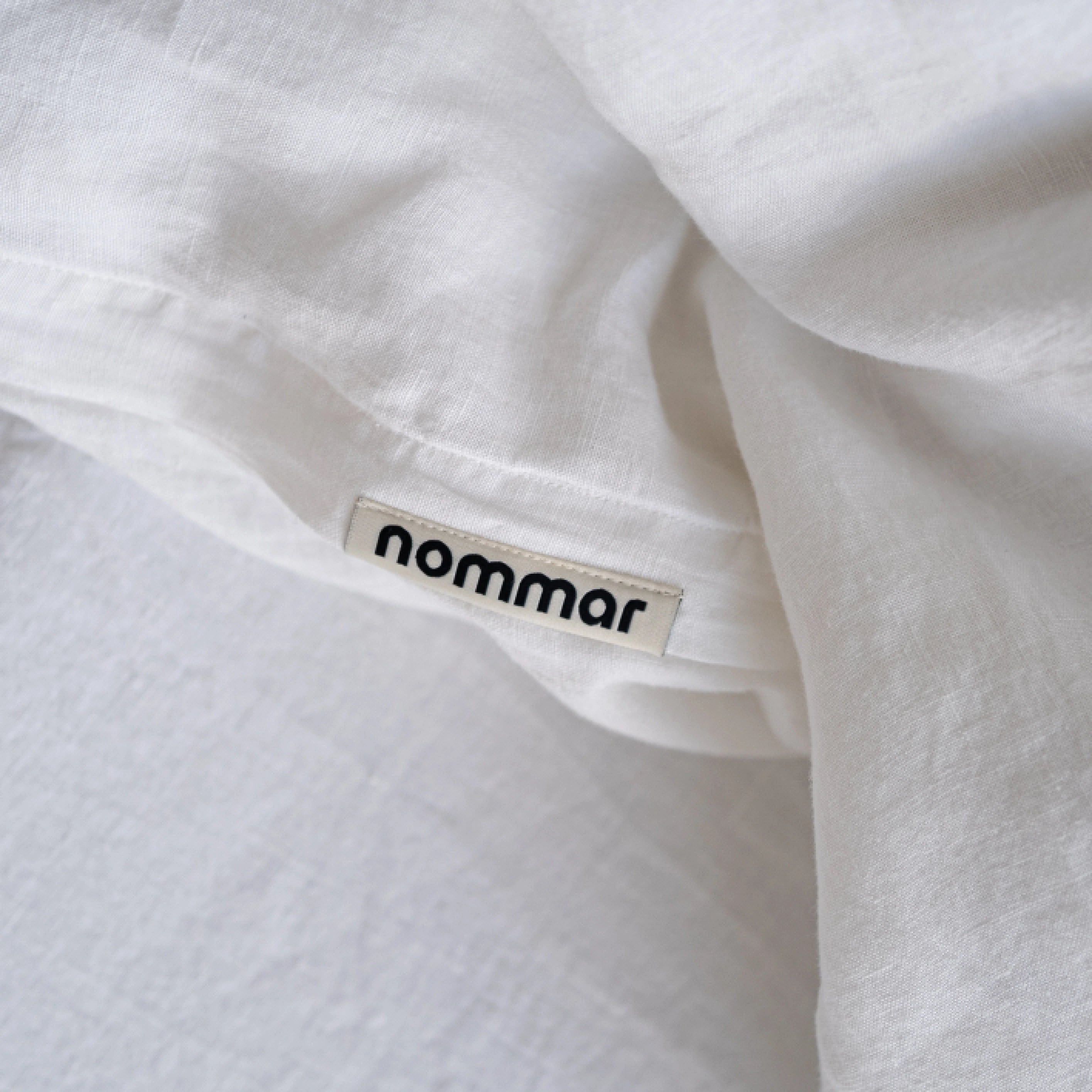 Hypoallergenic white stonewashed linen bedding crafted in Lithuania.