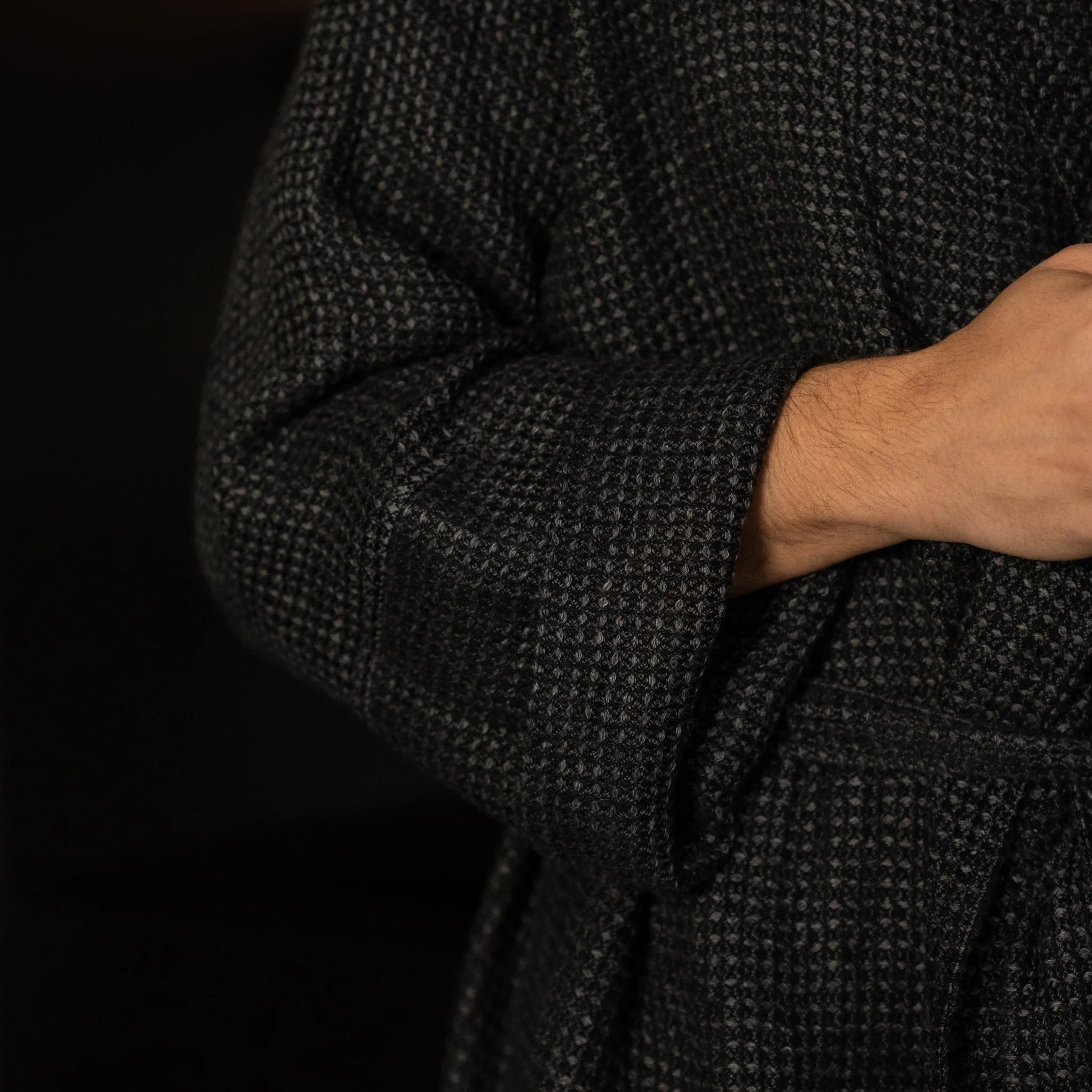 Close-up of light Nommar Atelier Linen Robe showing waffle linen texture and double-layered structured sleeve